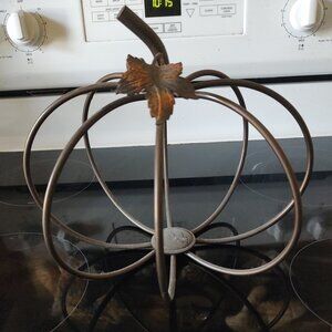 Metal pumpkin votive candle holder
